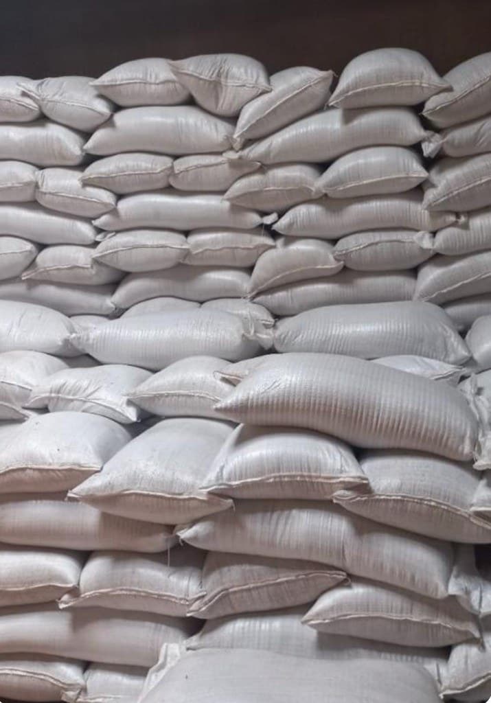 Stacked commodity sacks in a warehouse